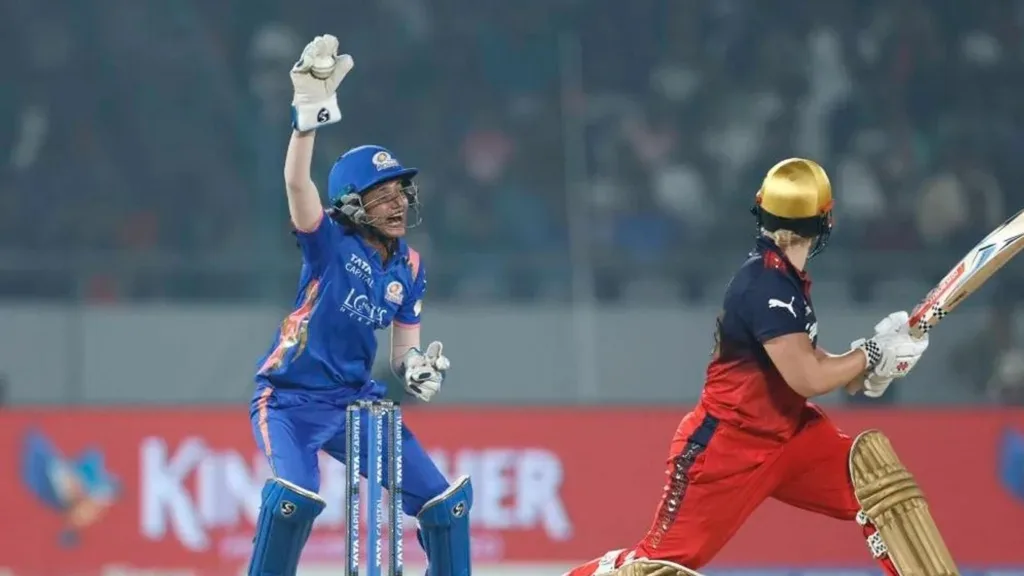 Rahila Firdous celebrates after latching to an edge from Georgia Voll in the WPL in Vadodara.